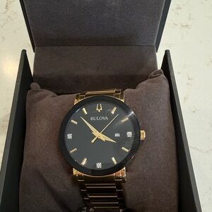 Bulova Gold Tone Watch with Black Dial and Crystal Accents